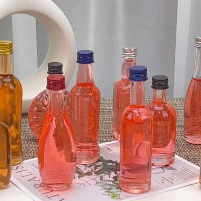 Customized Extra-Flint Glass Liquor Bottles With Cork Finish Manufacturers From China Profile Picture